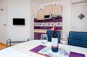 TV a/nebo společenská místnost v ubytování La Svalba Rooms & Studios