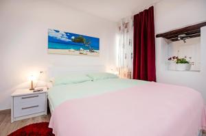 Postel nebo postele na pokoji v ubytování La Svalba Rooms & Studios