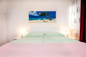 Postel nebo postele na pokoji v ubytování La Svalba Rooms & Studios