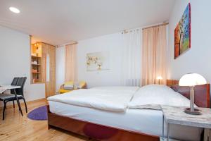 Postel nebo postele na pokoji v ubytování La Svalba Rooms & Studios