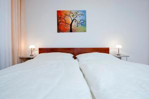 Postel nebo postele na pokoji v ubytování La Svalba Rooms & Studios