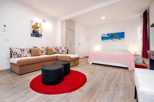 Postel nebo postele na pokoji v ubytování La Svalba Rooms & Studios