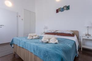 Posteľ alebo postele v izbe v ubytovaní Studio Villa Ivka