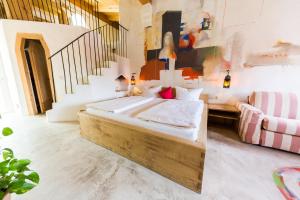 Postel nebo postele na pokoji v ubytování Hotel San Gabriele