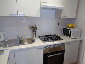 Kuchnia lub aneks kuchenny w obiekcie EDIFICIO APOLO 4