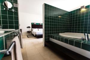Voodi või voodid majutusasutuse Hotel Dunas de Sal toas