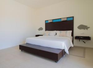 Voodi või voodid majutusasutuse Hotel Dunas de Sal toas