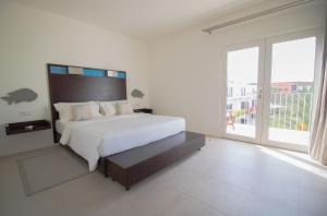 Voodi või voodid majutusasutuse Hotel Dunas de Sal toas