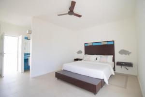 Voodi või voodid majutusasutuse Hotel Dunas de Sal toas