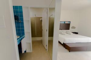 Voodi või voodid majutusasutuse Hotel Dunas de Sal toas