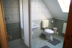 Kúpeľňa v ubytovaní Szanyi Vendégház