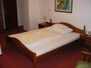 Postel nebo postele na pokoji v ubytování Hotel Fama + 29 fotografií