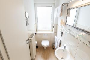 Koupelna v ubytování Hotel Porta Nigra