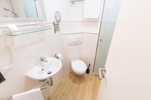 Koupelna v ubytování Hotel Porta Nigra
