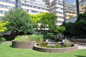 a garden in front of a tall building at Marlyn Lodge – City of London in London