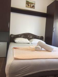 Voodi või voodid majutusasutuse Guesthouse Marko toas