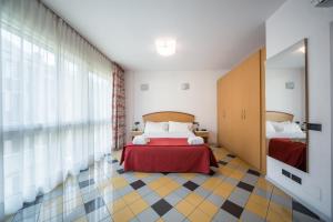 Un pat sau paturi într-o cameră la Piazzi House