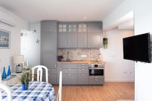 Kuchyň nebo kuchyňský kout v ubytování Apartamento Mediterraneo View