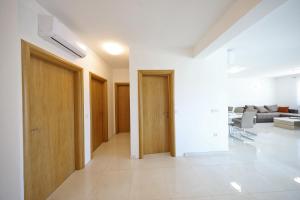 Posteľ alebo postele v izbe v ubytovaní Apartmani Vlado Mitar