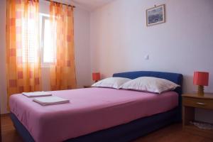 Posteľ alebo postele v izbe v ubytovaní Apartments Boćin Rosso