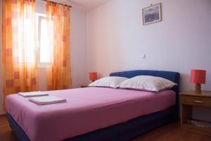 Posteľ alebo postele v izbe v ubytovaní Apartments Boćin Rosso