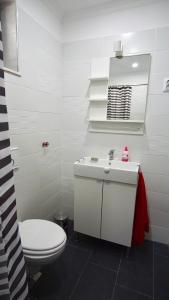 Ein Badezimmer in der Unterkunft Apartmani Laura