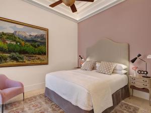 Posteľ alebo postele v izbe v ubytovaní Hotel Gloria de Sant Jaume