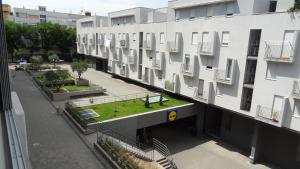 an overhead view of a building with a green courtyard at Cvit Jadrana in Split
