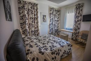 Postel nebo postele na pokoji v ubytování A casa di V-Ale