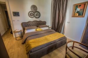 Postel nebo postele na pokoji v ubytování A casa di V-Ale