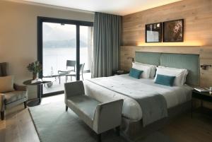 Postel nebo postele na pokoji v ubytování Filario Hotel & Residences + 37 fotografií