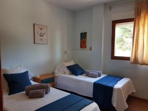 A bed or beds in a room at ***CHALET ALICANTE*** EXPERIENCIA UNICA Még 33 kép