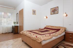 Postel nebo postele na pokoji v ubytování Willa Nova - 4 minuty od plazy