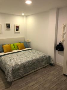 Postel nebo postele na pokoji v ubytování Apartamento plaza toros + 6 fotografií