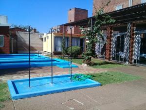 Bazén v ubytování Brisas Del Rio Apart Hotel nebo v jeho okolí