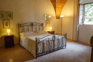מיטה או מיטות בחדר ב-Agriturismo Bella Valle