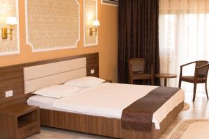 Кровать или кровати в номере Complex Azar
