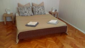 Postel nebo postele na pokoji v ubytování Jovich Apartments 1