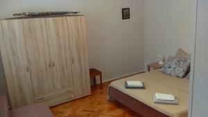 Postel nebo postele na pokoji v ubytování Jovich Apartments 1