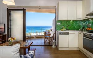 A kitchen or kitchenette at Platanias Sky View