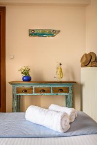 A bed or beds in a room at Platanias Sky View