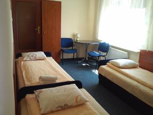 Postel nebo postele na pokoji v ubytování Mixbud