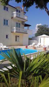 Bazén v ubytování House apartments Ariamare nebo v jeho okolí