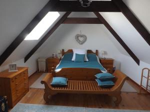 מיטה או מיטות בחדר ב-Les Chouettes