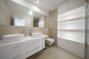 Łazienka w obiekcie Apartmani Postimana