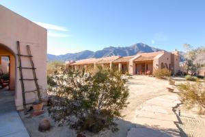 a view of a house with mountains in the background at Borrego Valley Inn in Borrego Springs