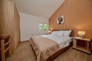 Ένα ή περισσότερα κρεβάτια σε δωμάτιο στο Passage Apartments