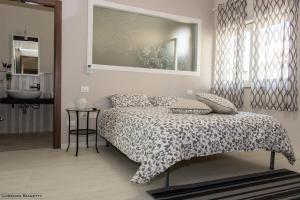 Postel nebo postele na pokoji v ubytování B&B Geolja