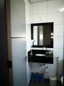 Um banheiro em Brasilia Parque Hotel