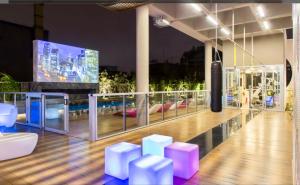 a room with a view of a city at night at Studio Augusta in Sao Paulo